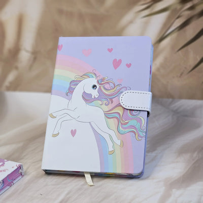 Four colorful pocket-sized diaries with unicorn illustrations, including a light blue diary that reads 'TIME TO BE A UNICORN', each with a clasp lock www.usmile.toys
