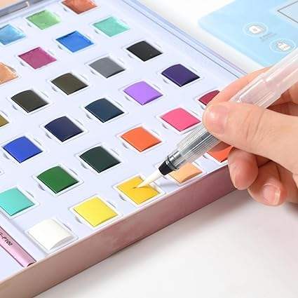 "Front view of the 'Solid Watercolor Paint Set' by Giorgione, a 36-color art kit with vibrant hues and shimmering 'Pearl Light' effects, perfect for artists and students." www.usmile.toys