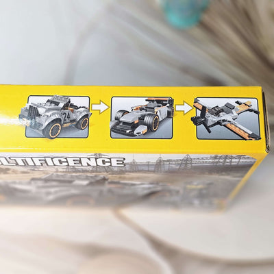 Front of the product packaging for a building block toy set, showing a constructed gray jeep-like vehicle and a character figure against a desert road background, promoting imaginative play from Usmile Toys.www.usmile.toys
