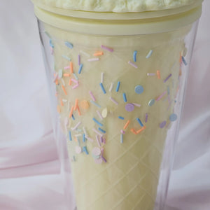 Fun Usmile Toys 'Oreo ice cream' themed tumblers for kids, featuring a pink tumbler with mint green 'frosting' and sprinkles, and a lime green tumbler with chocolate drizzle. These unique sipper cups are ideal for parties and making drinks exciting." www.usmile.toys
